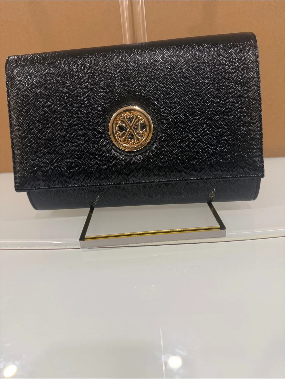 Black Leather Crossbody Bag with Gold Logo Accent